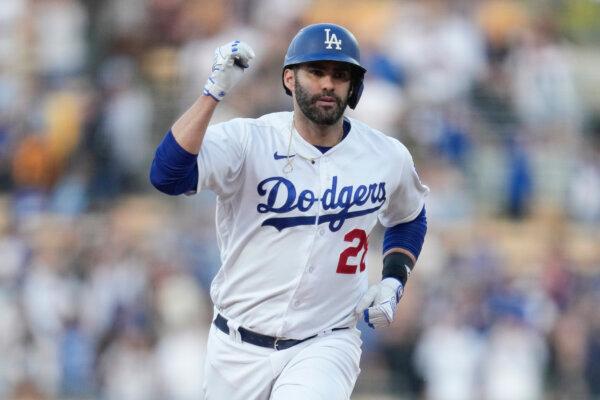 Los Angeles Dodgers designated hitter J.D. Martinez (28) runs the bases after hitting a home run during the second inning of a baseball game against the San Francisco Giants in Los Angeles on Sept. 23, 2023. (Ashley Landis/AP Photo)