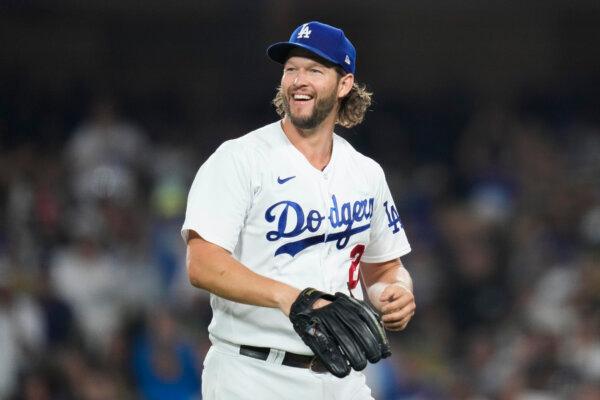  Los Angeles Dodgers starting pitcher Clayton Kershaw (22) reacts after left fielder David Peralta caught a line drive hit by San Francisco Giants' Austin Slater during the fifth inning of a baseball game in Los Angeles on Sept. 23, 2023. (Ashley Landis/AP Photo)