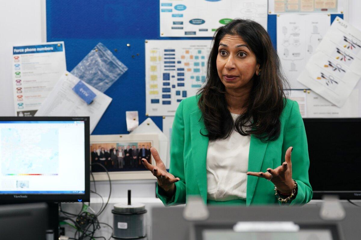 Home Secretary Suella Braverman visits a digital forensics lab during her visit to Kent Police headquarters in Maidstone, Kent, on Sept. 19, 2023. (Gareth Fuller/PA Wire)