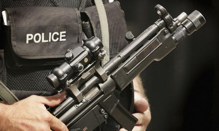 Home Secretary Orders Review as Armed Police Officers Return Guns