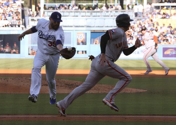 Taylor's RBI Single in 10th Lifts Dodgers to 3–2 Win Over Giants