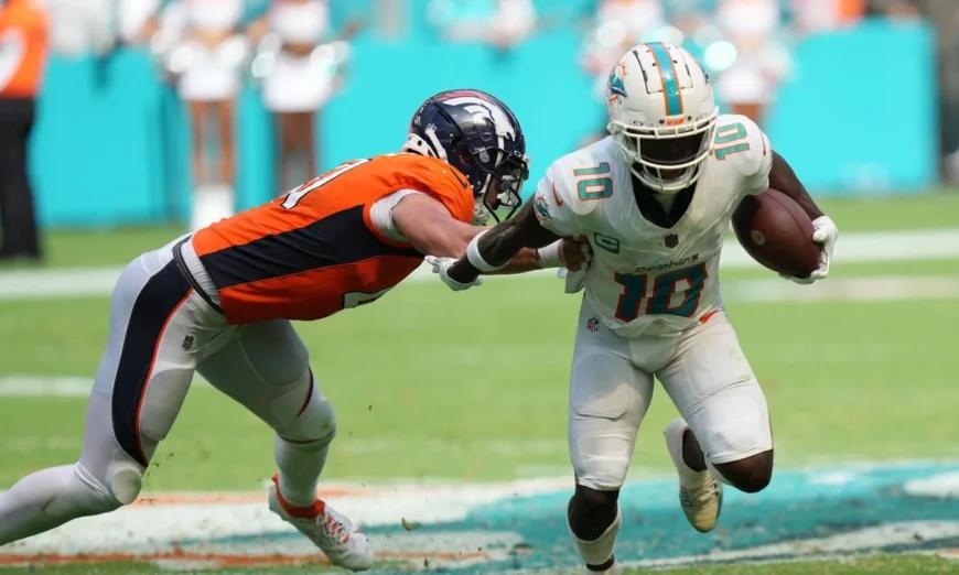 NFL Roundup: Dolphins Score 70 Points in Routing Broncos