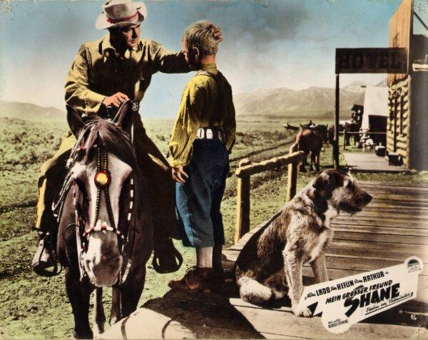 A lobby card showing the close relationship between Shane (Alan Ladd) and the Starrett boy (Brandon De Wilde). (MovieStillDB)