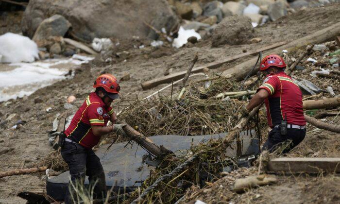 At Least 6 People Are Dead and 12 Missing After Flash Flood in Guatemala Sweeps Homes Into River