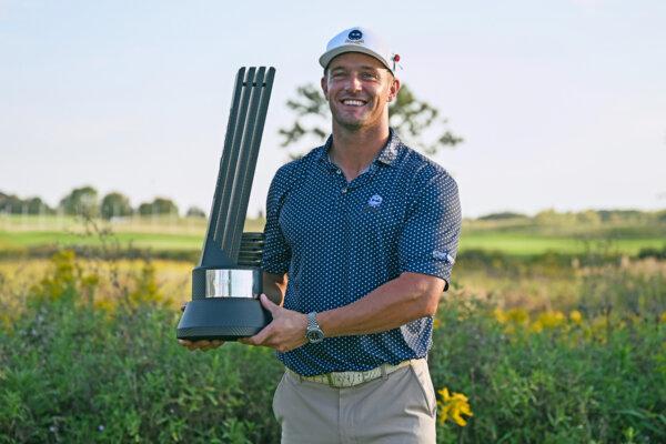 Bryson DeChambeau poses with the trophy after winning the LIV Golf Invitational - Chicago at Rich Harvest Farms in Sugar Grove, Illi., on Sept. 24, 2023 (Quinn Harris/Getty Images)