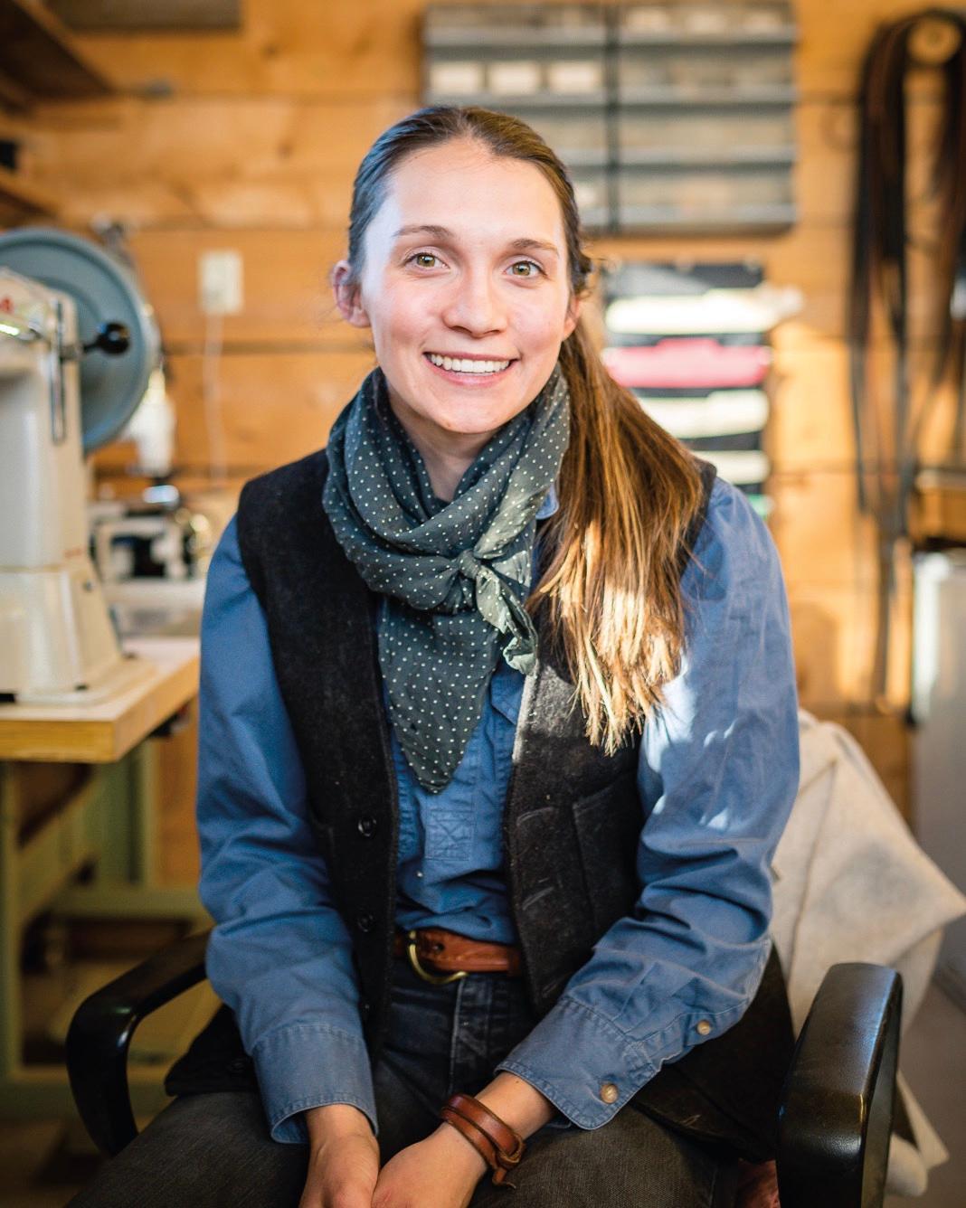 One of the leather craftswomen at Chico Basin. (Abby Santurbane)