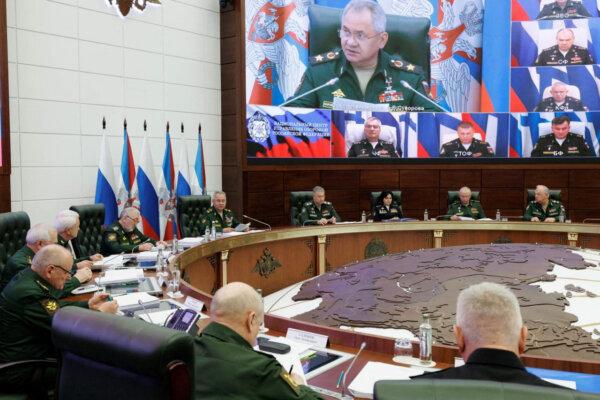 Russian Defense Minister Sergey Shoigu chairs a meeting with the leadership of the Armed Forces as Russian fleet commanders are seen on a screen via video link in Moscow, in a picture released on Sept. 26, 2023. (Russian Defense Ministry/Handout via Reuters)