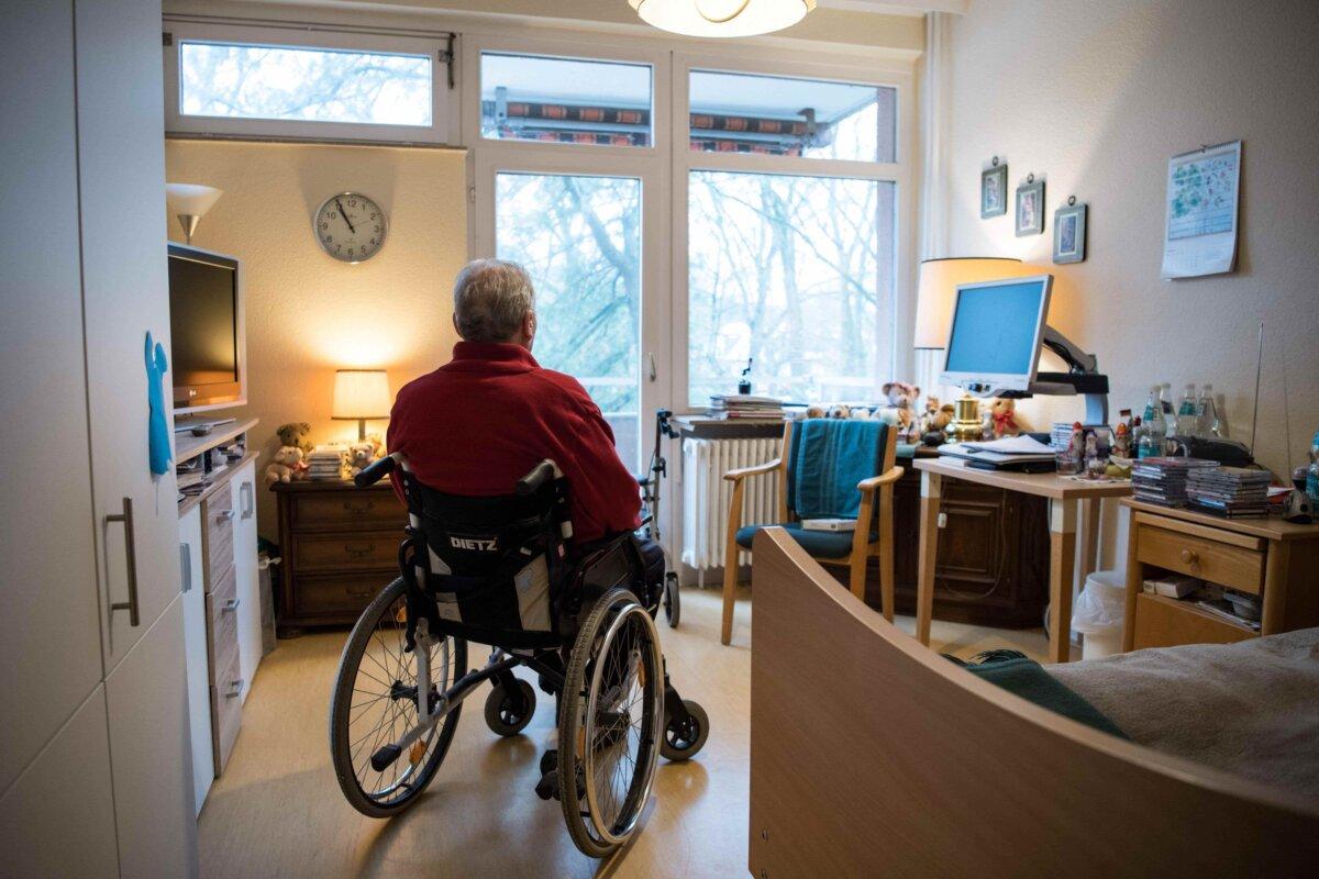 A resident sits in a wheelchair in his room in a nursing home in Berlin on January 14, 2021, amid the novel coronavirus (Covid-19) pandemic.(Photo by Stefanie Loos/AFP via Getty Images)