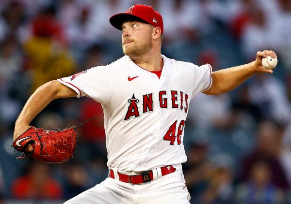 Reid Detmers (48) of the Los Angeles Angels throws against the Texas Rangers in the first inning at Angel Stadium of Anaheim in Anaheim, Calif., on Sept. 26, 2023. (Ronald Martinez/Getty Images)
