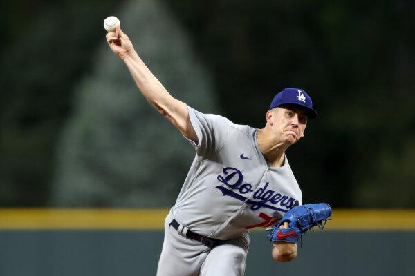 Starting pitcher Bobby Miller (70) of the Los Angeles Dodgers throws against the Colorado Rockies in the first inning during Game Two of a Doubleheader at Coors Field in Denver on Sept. 26, 2023. (Matthew Stockman/Getty Images)