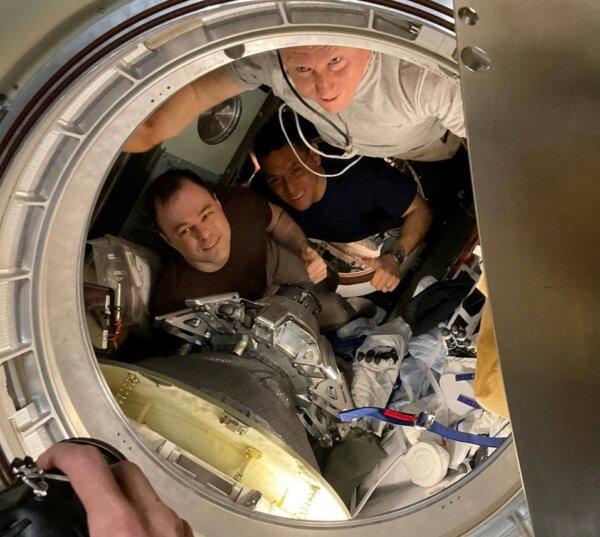 ISS crew, formed of Roscosmos cosmonauts Sergey Prokopyev, Dmitry Petelin and NASA astronaut Frank Rubio, pose for a picture before undocking of the Soyuz MS-23 space capsule as they leave the International Space Station and head for a parachute-assisted landing on the steppe of Kazakhstan, on Sept. 27, 2023. (Konstantin Borisov/Roscosmos/Handout via Reuters)