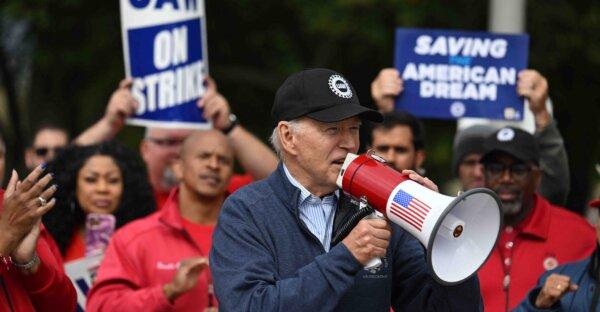 President Joe Biden addresses striking members of the United Auto Workers (UAW) union at a picket line outside a General Motors service parts operations plant in Belleville, Mich., on Sept. 16, 2023. (Jim Watson/AFP/Getty Images)