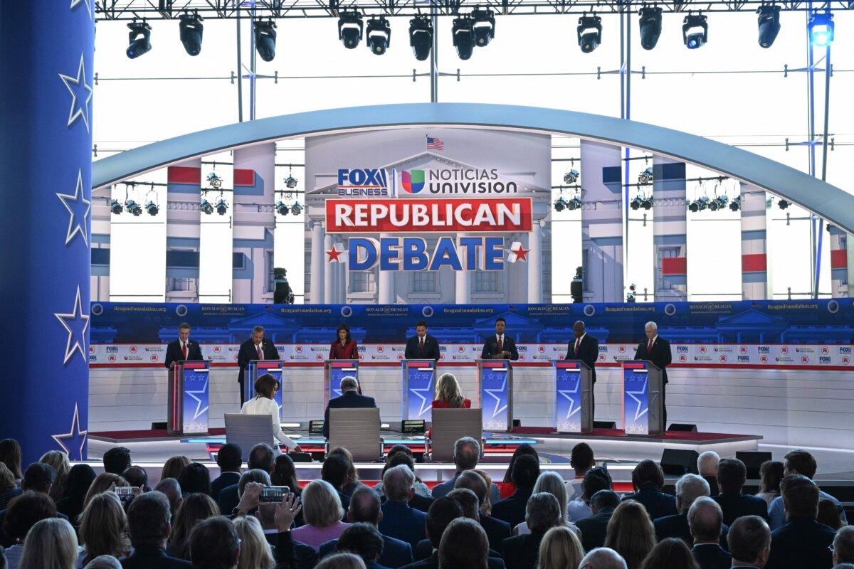 (L–R) North Dakota Gov. Doug Burgum, former New Jersey Gov. Chris Christie, former South Carolina Gov. and UN ambassador Nikki Haley, Florida Gov. Ron DeSantis, entrepreneur Vivek Ramaswamy, South Carolina Sen. Tim Scott, and former Vice President Mike Pence take part in the second Republican presidential primary debate at the Ronald Reagan Presidential Library in Simi Valley, Calif. on Sept. 27, 2023. (Robyn Beck/AFP via Getty Images)