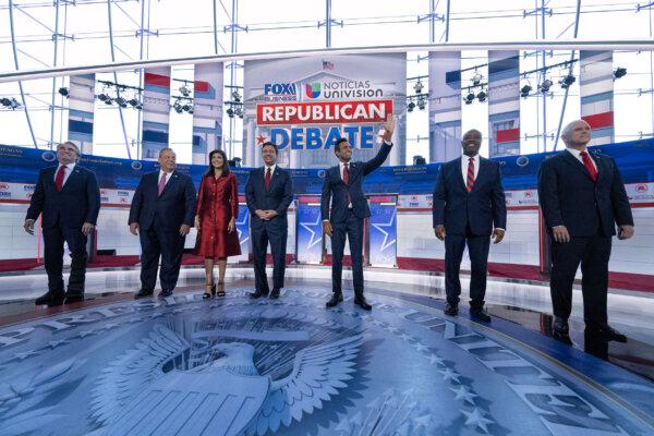 (L–R) North Dakota Gov. Doug Burgum, former New Jersey Gov. Chris Christie, former South Carolina Gov. and UN ambassador Nikki Haley, Florida Gov. Ron DeSantis, entrepreneur Vivek Ramaswamy, South Carolina Sen. Tim Scott, and former Vice President Mike Pence at the second Republican presidential primary debate at the Ronald Reagan Presidential Library in Simi Valley, Calif. on Sept. 27, 2023. (PEDRO UGARTE/AFP via Getty Images)