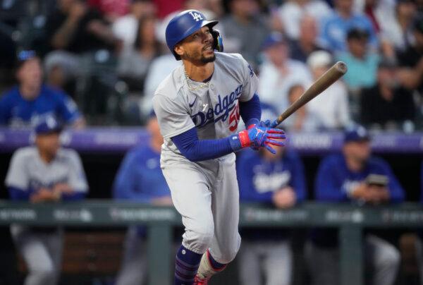 Los Angeles Dodgers' Mookie Betts flies out against Colorado Rockies starting pitcher Noah Davis during the first inning of a baseball game in Denver on Sept. 27, 2023. (David Zalubowski/AP Photo)