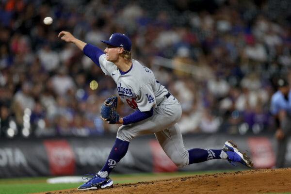 Starting pitcher Emmet Sheehan (80) of the Los Angeles Dodgers throws against the Colorado Rockies in the third inning at Coors Field in Denver on Sept. 27, 2023. (Matthew Stockman/Getty Images)