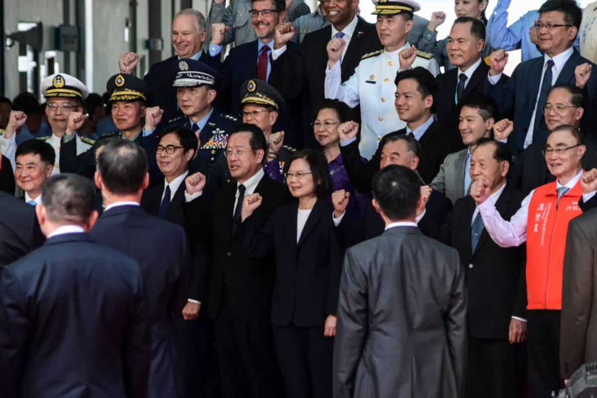 Taiwan President Tsai Ing-wen (C) poses for a photo during a ceremony to unveil Taiwan's first locally built submarine "Narwhal" at the CSBC Corp. shipbuilding company in Kaohsiung on Sept. 28, 2023. (Sam Yeh/AFP via Getty Images)