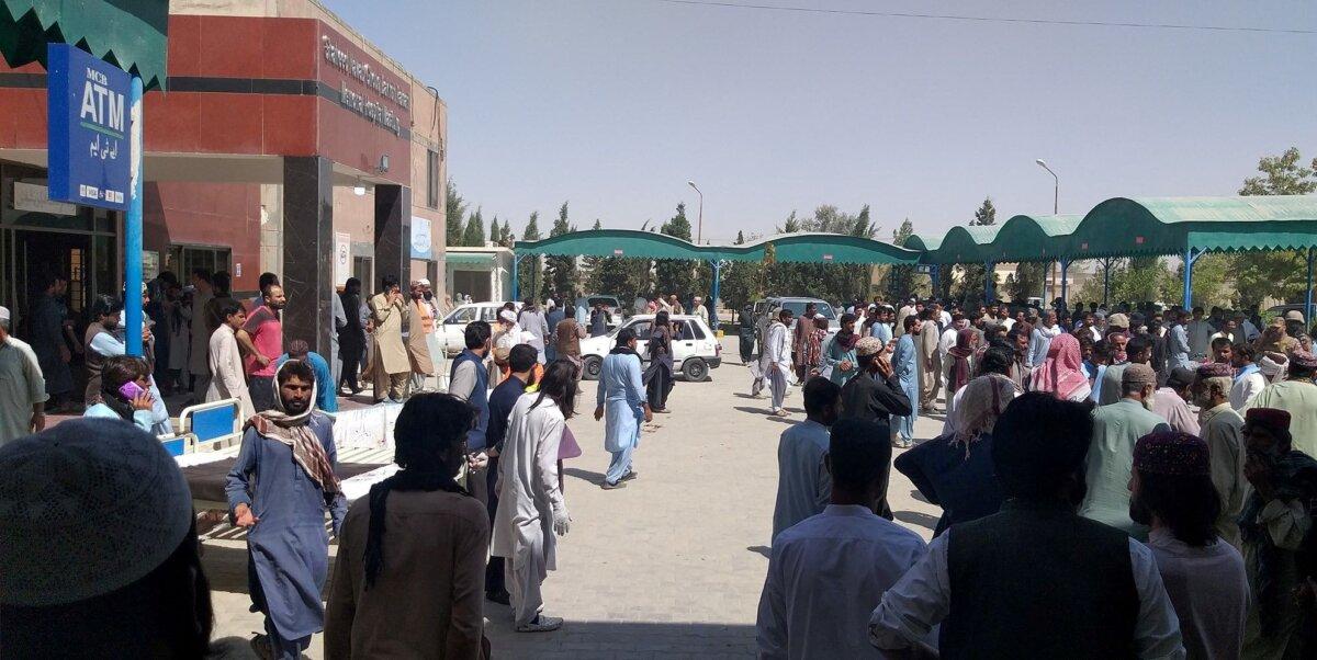 People gather outside the Mastung hospital following a deadly suicide attack on a religious gathering in Balochistan Province, Pakistan, on Sept. 29, 2023. (Shaheed Nawab Ghous Bakhsh Raisani Memorial Hospital Mastung/Handout via Reuters)