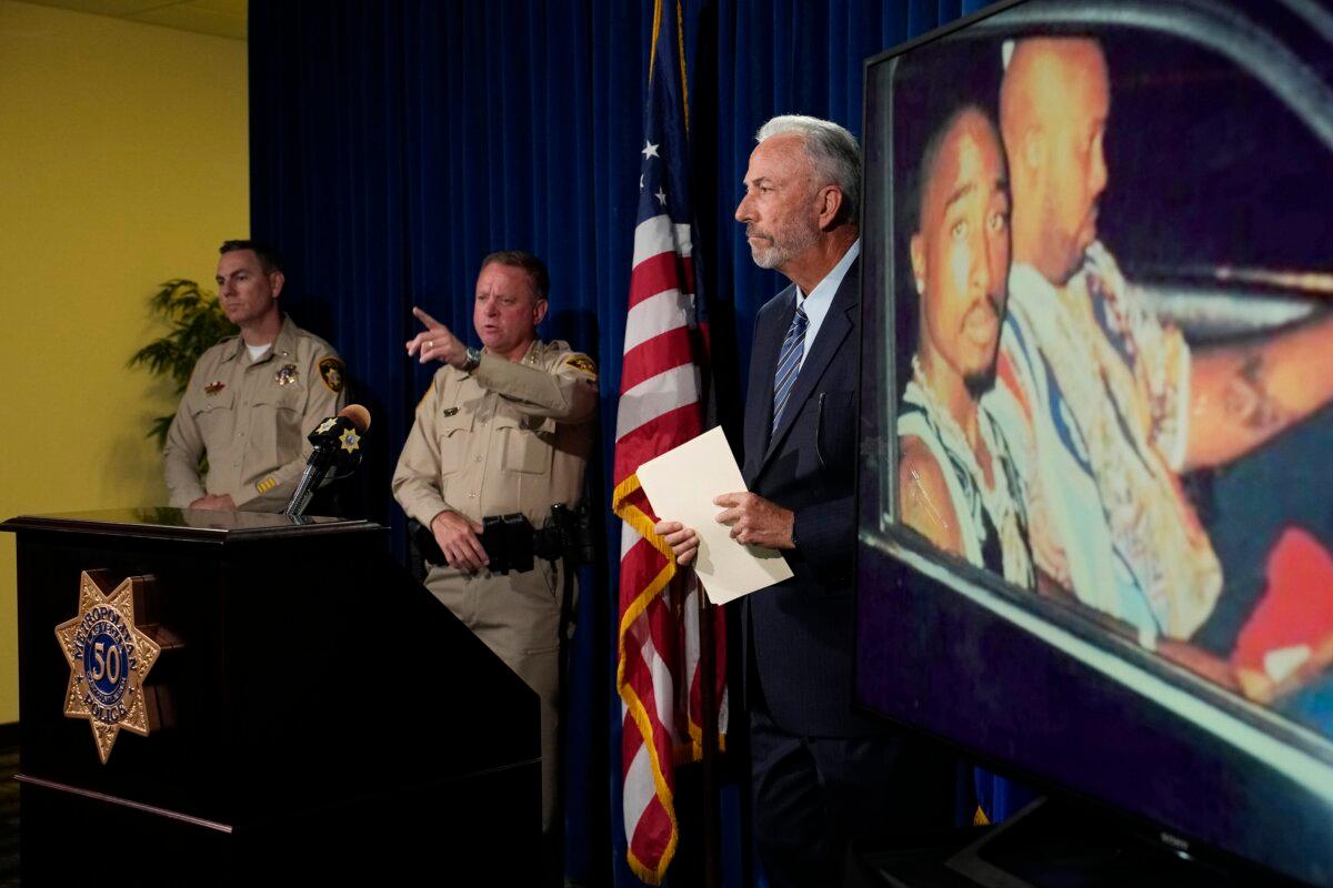 (L–R) Las Vegas police Lt. Jason Johansson, Sheriff Kevin McMahill, and Clark County District Attorney Steve Wolfson attends a news conference on an indictment in the 1996 murder of rapper Tupac Shakur, in Las Vegas on Sept. 29, 2023. (John Locher/AP Photo)