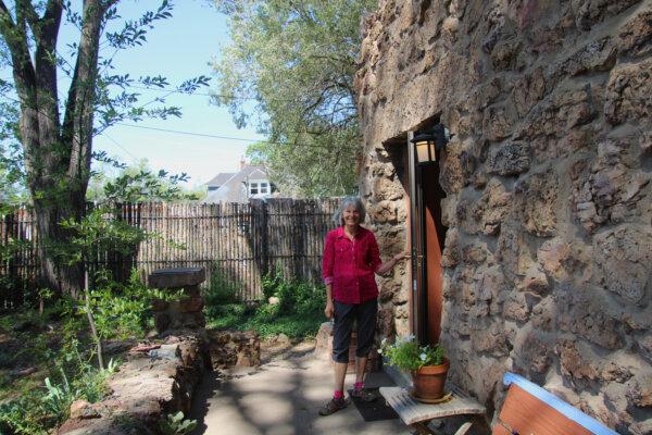 Las Vegas, New Mexico, is a big Airbnb town. Here, Jan Beurskens stands in front of the historic Rock House, a beautiful stone cottage Airbnb that she owns with her husband, Frank. (Mary Ann Anderson/TNS)