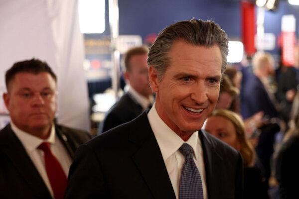 California Gov. Gavin Newsom talks to reporters in the spin room following the FOX Business Republican Primary Debate at the Ronald Reagan Presidential Library in Simi Valley, Calif., on Sept. 27, 2023. (Mario Tama/Getty Images)