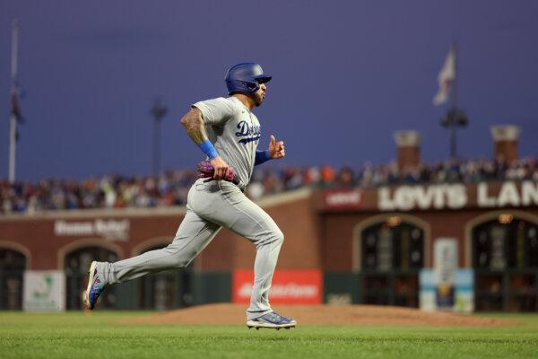 David Peralta (6) of the Los Angeles Dodgers runs home to score in the fifth inning against the San Francisco Giants at Oracle Park in San Francisco on Sept. 30, 2023. (Ezra Shaw/Getty Images)