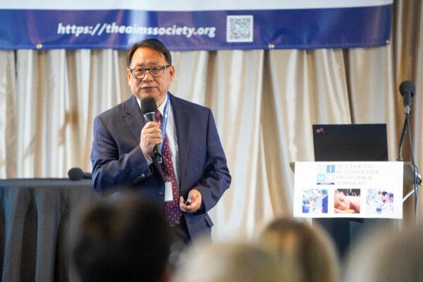 Dr. Jingduan Yang at the first symposium hosted by the Aesthetic Integrative Medicine and Surgery Society at Northern Medical Center in Middletown, N.Y., on Oct. 1, 2023. (Cara Ding/The Epoch Times)