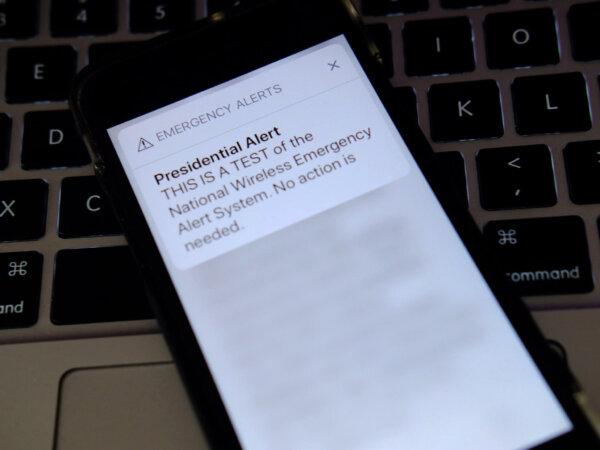 In this photo illustration, a phone displays an emergency alert message that reads "THIS IS A TEST of the National Wireless Emergency Alert System. No action is needed" in N.Y.C., on Oct. 3, 2018. (Photo Illustration by Theo Wargo/Getty Images)