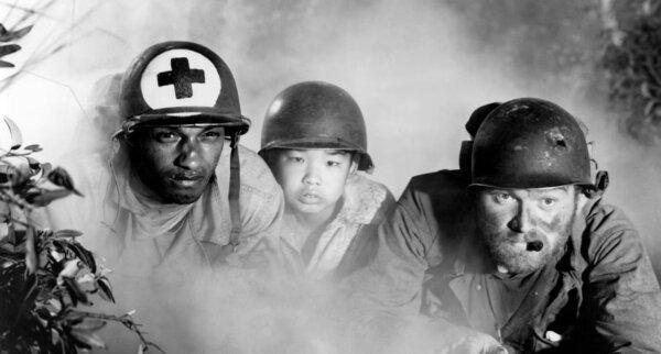 (L-R): Cpl. Thompson (James Edwards), Short Round (William Chun), and Sgt. Zack (Gene Evans), in “The Steel Helmet.” (Lippert Pictures)