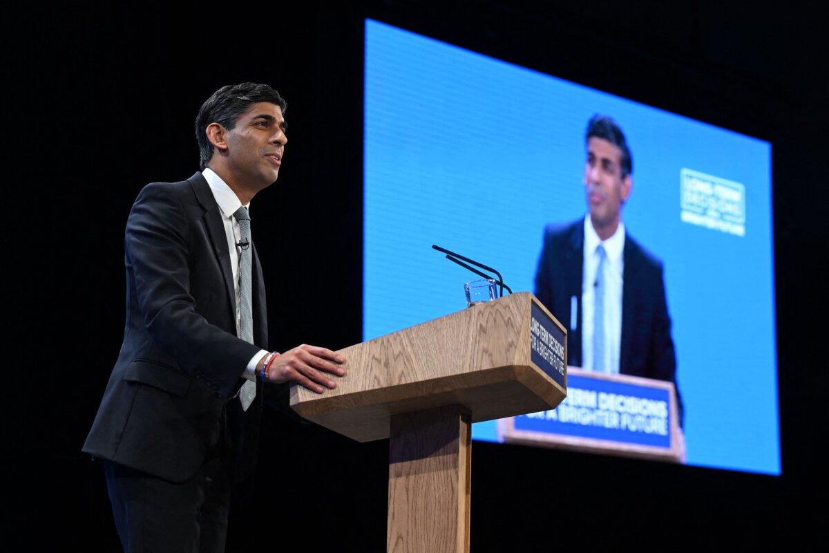 Britain's Prime Minister Rishi Sunak addresses delegates at the annual Conservative Party Conference in Manchester, England, on Oct. 4, 2023. (Oli Scarff/AFP via Getty Images)