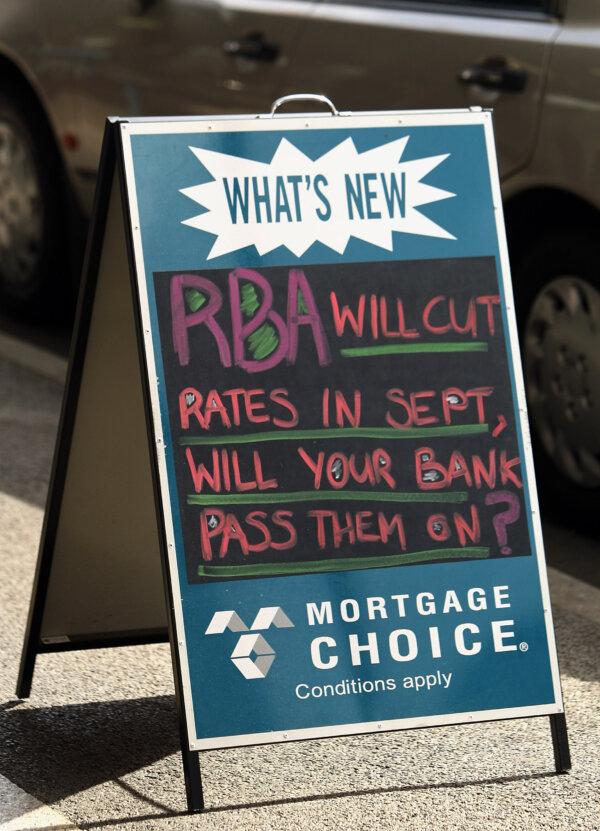 A mortgage brokers advertising sign stands on the street in Melbourne, Australia, on Sept. 1, 2008. (Mark Dadswell/Getty Images)