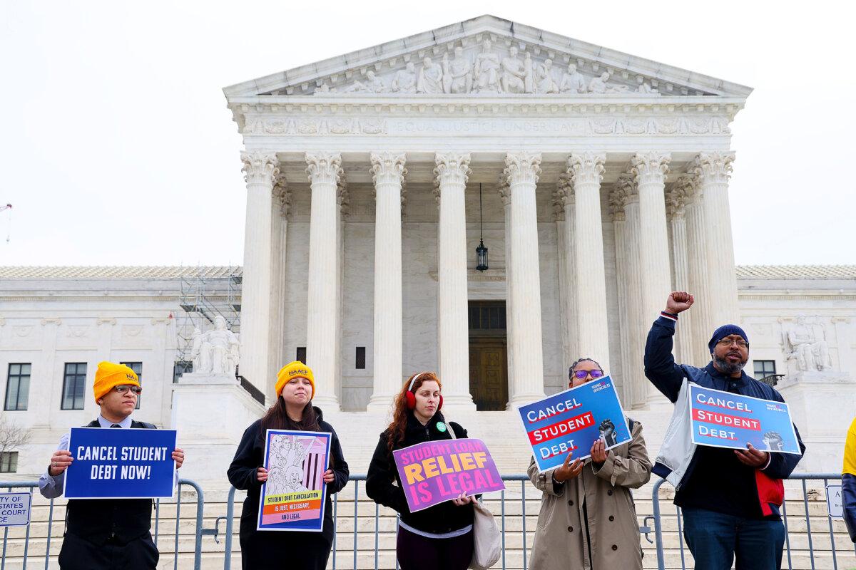 People participate in a rally over canceling student debt outside the U.S. Supreme Court in Washington on Feb. 28, 2023. (Jemal Countess/Getty Images for People's Rally to Cancel Student Debt )