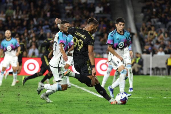 Los Angeles FC forward Denis Bouanga (99) scores against the Minnesota United in the first half at BMO Stadium in Los Angeles, on Oct 4, 2023. (Courtesy of Los Angeles FC via The Epoch Times)