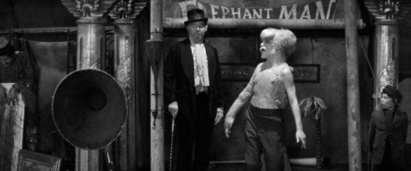 Bytes (Freddie Jones, L) and John Merrick (John Hurt), in “The Elephant Man.” (Paramount Pictures)