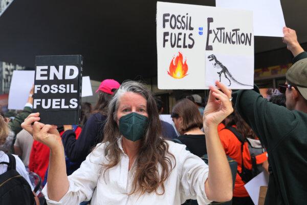 Climate activists participate in a rally outside of the Museum of Modern Art (MoMA) in New York City, on September 15, 2023. (Photo by Michael M. Santiago/Getty Images)