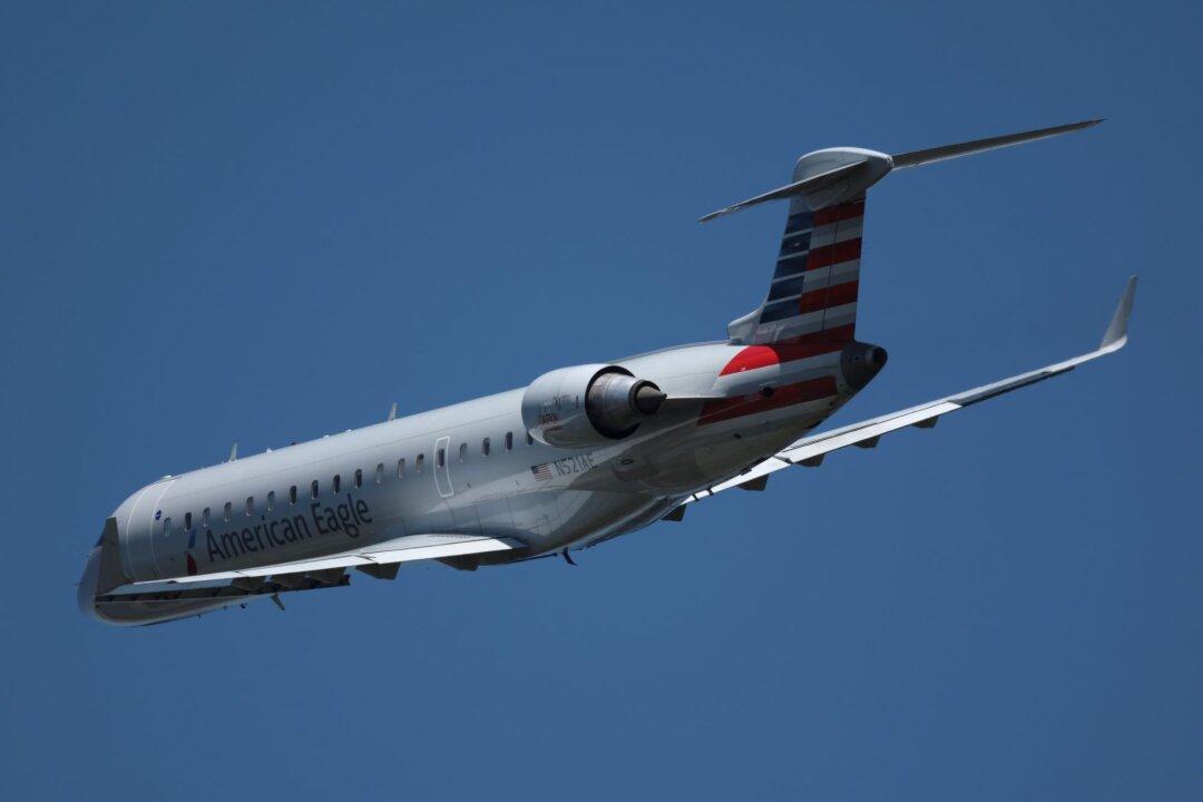 A Taxiing Airplane Collides With a Chicago Airport Shuttle, Injuring 2 People