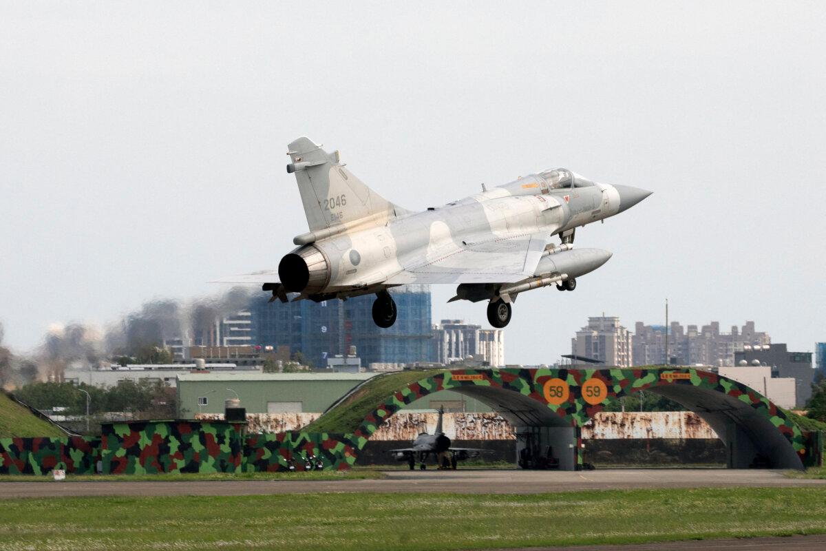 A Taiwanese Air Force Mirage 2000 fighter jet lands at an air force base in Hsinchu, northern Taiwan, on April 9, 2023. (Jameson Wu/AFP via Getty Images)