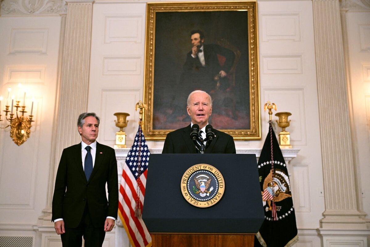 President Joe Biden, with Secretary of State Antony Blinken, addresses the attacks in Israel from the State Dining Room of the White House in Washington, DC, on Oct, 7, 2023. ( Jim Watson/AFP via Getty Images)