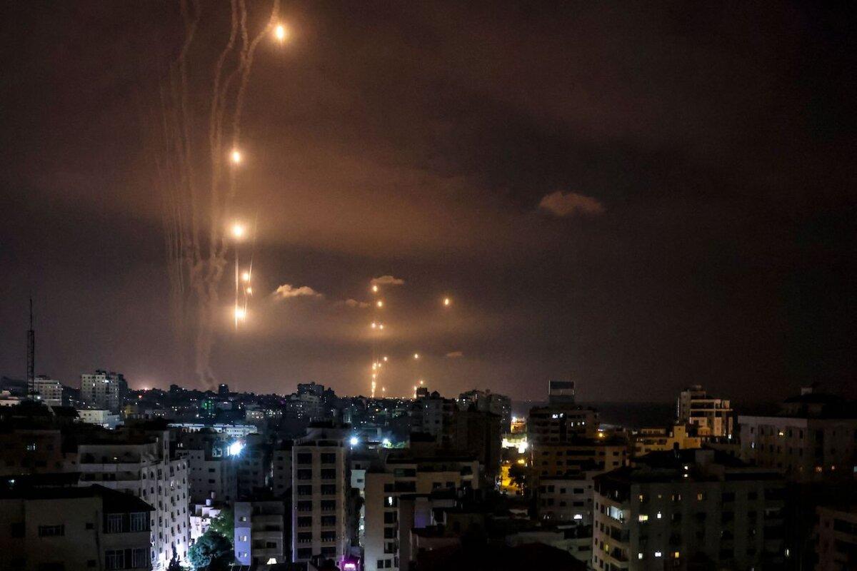 Rockets fired by Hamas terrorists from Gaza City are intercepted by the Israeli Iron Dome defense missile system on Oct. 7, 2023. (Mohammed Abed/AFP via Getty Images)