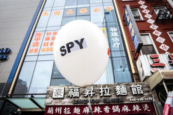 A balloon is seen at a press conference and rally highlighting Beijing's transnational repression, in front of the America ChangLe Association in New York City on Feb. 25, 2023. A now-closed overseas Chinese police station is located inside the association building. (Samira Bouaou/The Epoch Times)