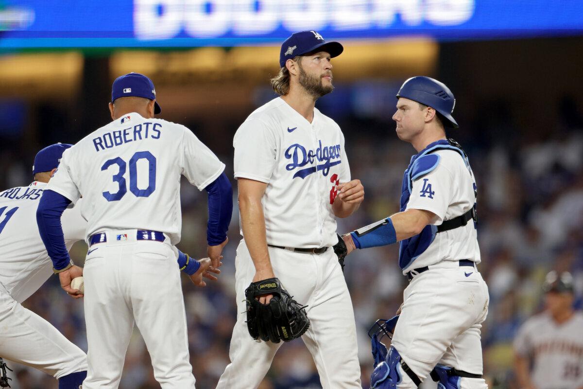 Manager Dave Roberts of the Los Angeles Dodgers relieves Clayton Kershaw (22) in the first inning against the Arizona Diamondbacks during Game One of the Division Series at Dodger Stadium in Los Angeles on Oct. 7, 2023. (Harry How/Getty Images)