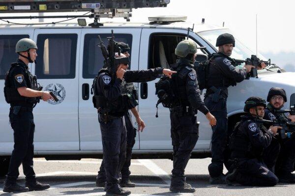 Israeli security forces take part in a search operation for Hamas militants near the southern city of Ashkelon, Israel, on Oct. 8, 2023. (Menahem Kahana/AFP via Getty Images)