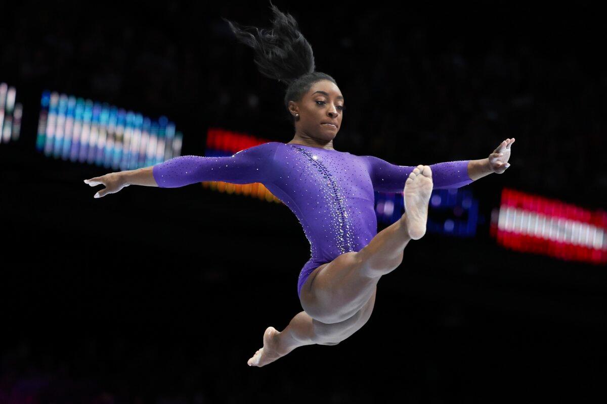 Simone Biles of the United States competes on the beam during the apparatus finals at the Artistic Gymnastics World Championships in Antwerp, Belgium, on Oct. 8, 2023. (Geert vanden Wijngaert/AP Photo)