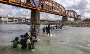 Biden Administration Threatens to Sue Texas Over New Border Security Law
