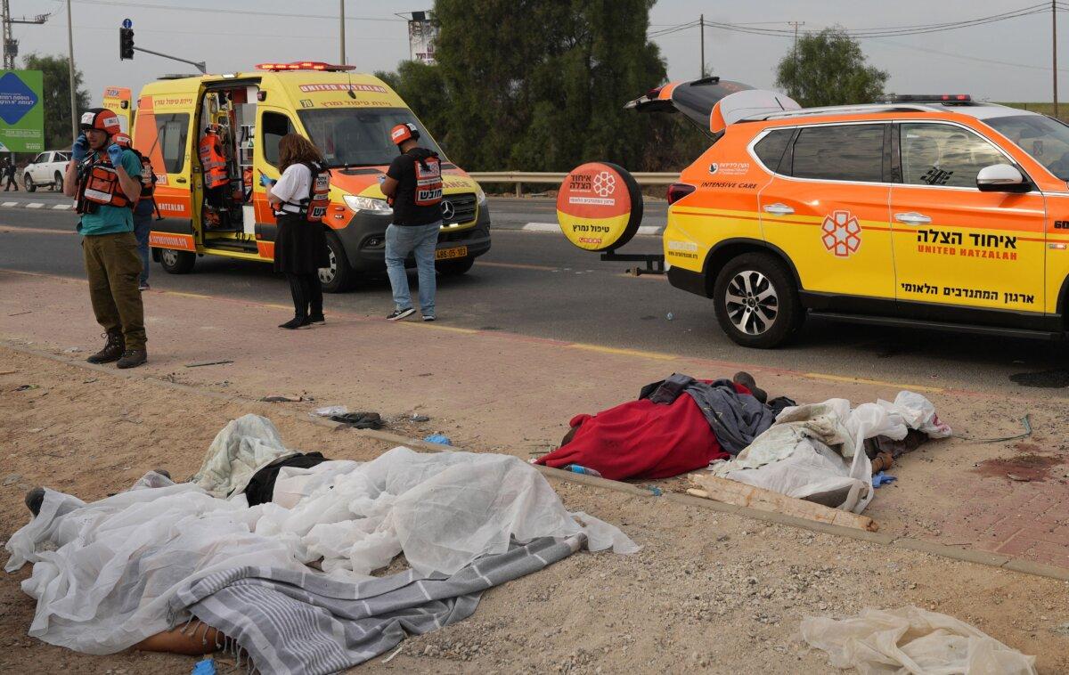 The bodies of civilians killed in the Hamas terrorist attacks are seen in the southern Israeli city of Sderot on Oct. 7, 2023. (Baz Ratner/AFP via Getty Images)