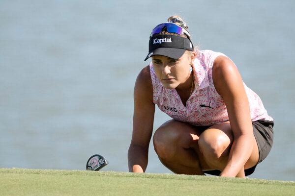 Lexi Thompson of the United States lines up a putt on the 18th green during the third round of The Ascendant LPGA benefiting Volunteers of America at Old American Golf Club in The Colony, Texas, on Oct. 8, 2023. (Photo by Sam Hodde/Getty Images)