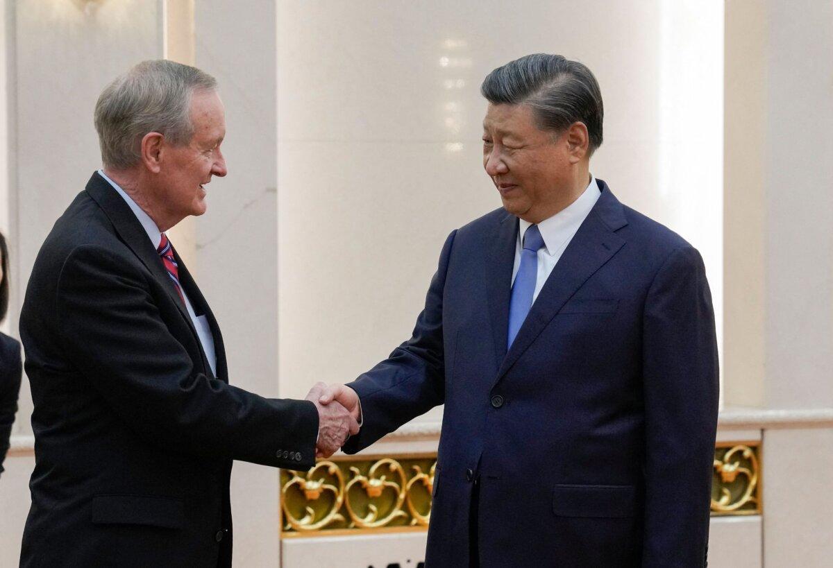 U.S. Sen. Mike Crapo (R-Idaho) (L) is greeted by Chinese leader Xi Jinping before their bilateral meeting in Beijing on Oct. 9, 2023. (Andy Wong/AFP via Getty Images)