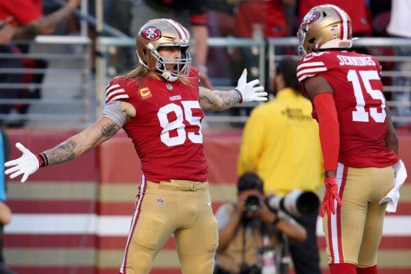 <br/>San Francisco 49ers tight end George Kittle (85) celebrates after catching a touchdown pass with wide receiver Jauan Jennings (15) during the first half of an NFL football game against the Dallas Cowboys in Santa Clara, Calif., on Oct. 8, 2023. (Jed Jacobsohn/AP Photo)