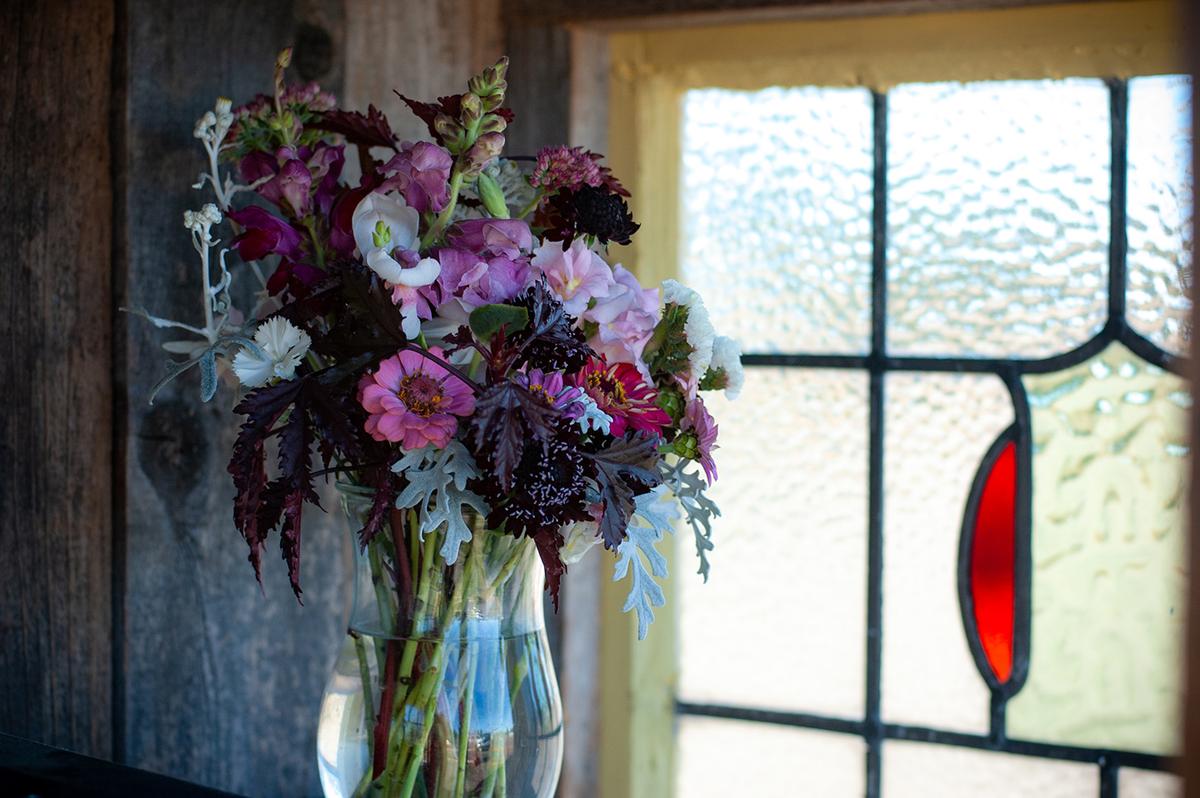 A local gardener selling their bouquets in a beautifully crafted farm stand in Sequim, Washington. (Jennifer Schneider)