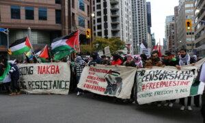 Pro-Palestine Protesters Crowd Into the Streets in Toronto, Blocking Traffic
